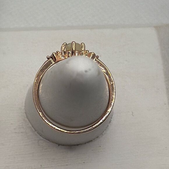 Brand New!! Size 7 ring with faux opal center stone and two flanking zircon ston - Picture 3 of 4